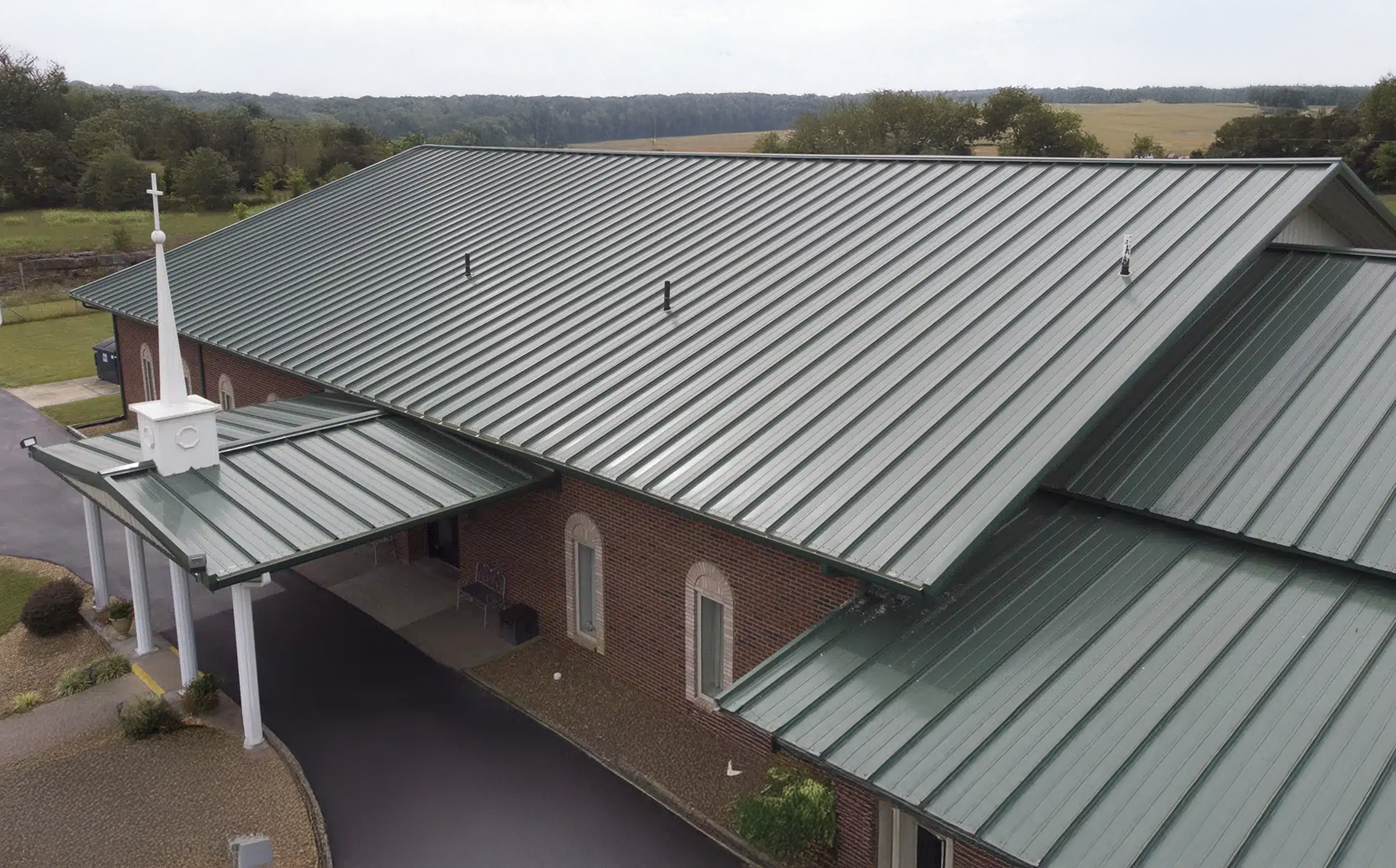 https://www.armourroofco.com/wp-content/uploads/2025/04/Metal-Roofing-Standing-Seam.png