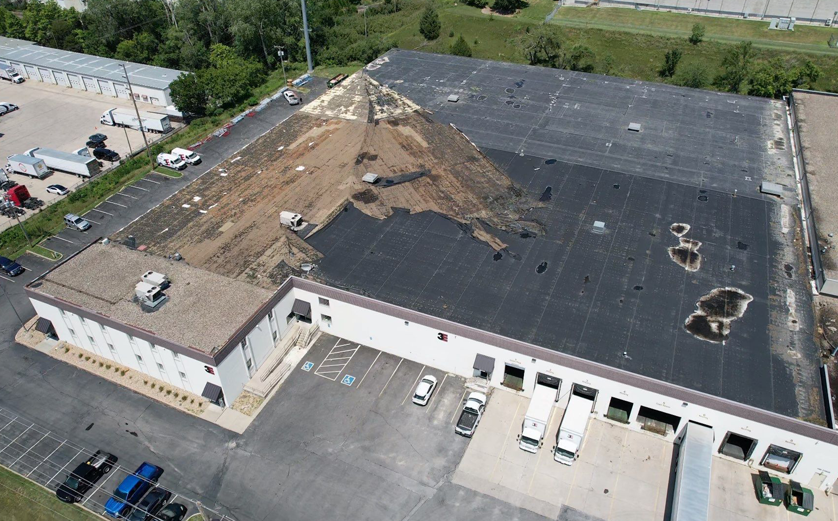 Storm Roof Damage Before Project